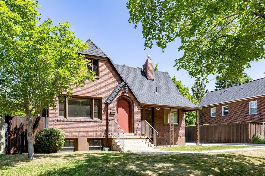 A darling all-brick Tudor in the coveted Harvard/Yale Historic District on Salt Lake City's east side - the kind of location buyers wait years to find. Stroll to neighborhood restaurants, the local market, and the tree-lined streets that have made this one of Salt Lake's most beloved pockets for generations. Minutes to the University of Utah, U of U Health, and Research Park, with downtown Salt Lake and the canyons all within easy reach. The big-ticket items are already handled - newer roof, recently built 2-car garage, and updated plumbing and electrical - leaving the next owner free to bring their own vision to the cosmetic refresh. A full basement with a separate entrance opens the door to mother-in-law apartment possibilities, guest quarters, or rental income potential. Classic Tudor character, walkable lifestyle, and a Harvard/Yale address - a rare opportunity in a neighborhood where homes like this rarely come available.