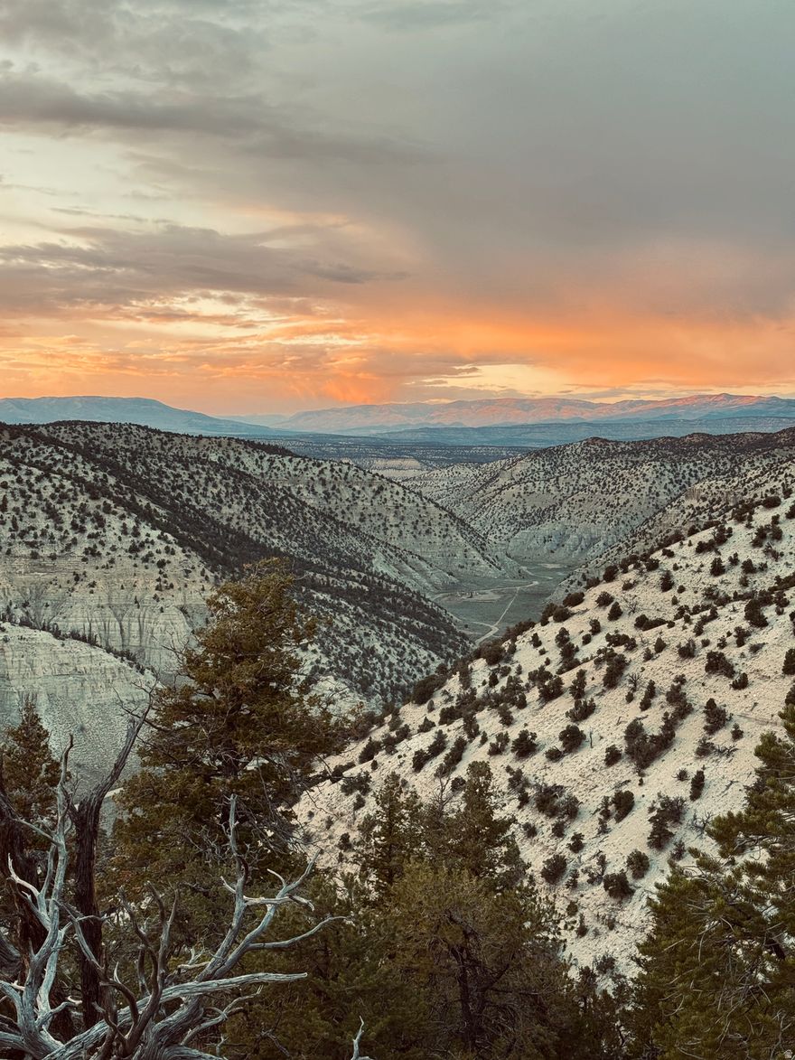 19.55 acres of mountain property located in the Lake Canyon area just outside Duchesne, approximately 5 minutes from Starvation Reservoir and about 25 minutes from downtown Duchesne. Year-round access via private road. One primary build site has already been leveled, with an additional location suitable for a cabin or secondary structure. When purchased together with the additional parcels, improvements already completed include a recent perc test (passed), water survey, approved water rights, engineered septic design with permit applied/approved, and fully engineered stamped home plans designed specifically for this property. Electric is currently about one mile away, with plans for extension in the near future. Solar is also an option. Excellent opportunity for recreation, hunting, or a private mountain build. Seller financing available with $20,000 down.