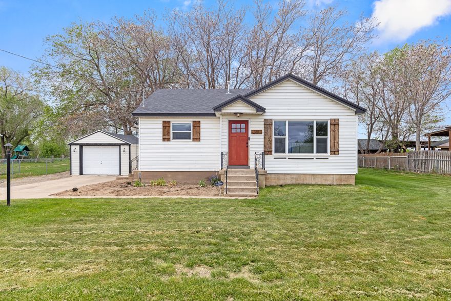 This charming home has 4 bedrooms, 2 full baths and sits on a spacious .50-acre lot! The lot is horse property (1 horse) and brings a country feeling, but you're still close to shopping and freeways. There are beautiful views from the property of the sunrise and the sunset. Updates include newer plumbing and electrical through the entire house and a 220 plug in garage. Then add these updates: NEW Furnace 2025, Sprinkler System 2024, NEW AC AND NEW Appliances in 2022!  And a new roof was put on in 10/2012. This home is ready to go! There is a walking/biking trail just behind the property for your enjoyment. Schedule your showing today!