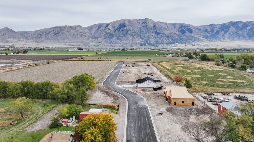 Beautiful lot available in a new subdivision in Elwood, Utah. Bring your own builder, or allow Cedar Ridge Homes to bring your vision to life and build the forever home you've always dreamed of. Choose from a variety of floor plans and design options to create the home that's perfect for you. Great location in a quiet, growing area with easy access to nearby amenities. Don't miss this opportunity to build your dream home with a trusted local builder.