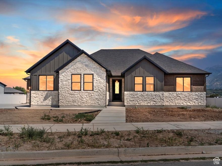 Spacious 5-bedroom, 3-bathroom home in the heart of South Weber. Located next to the elementary school and within walking distance to a neighborhood park. Enjoy stunning mountain views, a deep third-car garage, and trailer parking. The large master suite features a roomy en-suite bath and an oversized walk-in closet. Functional layout, great natural light, and a family-friendly location make this home a must-see!   Buyer to verify all information.