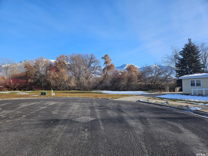 Vacant land near commercial development all 3 parcels must be sold together 02-139-0007, 02-139-0008, 02-139-0005. Additional land available great investment/ development opportunity future road to connect  700 South to Golf Course road to the south.