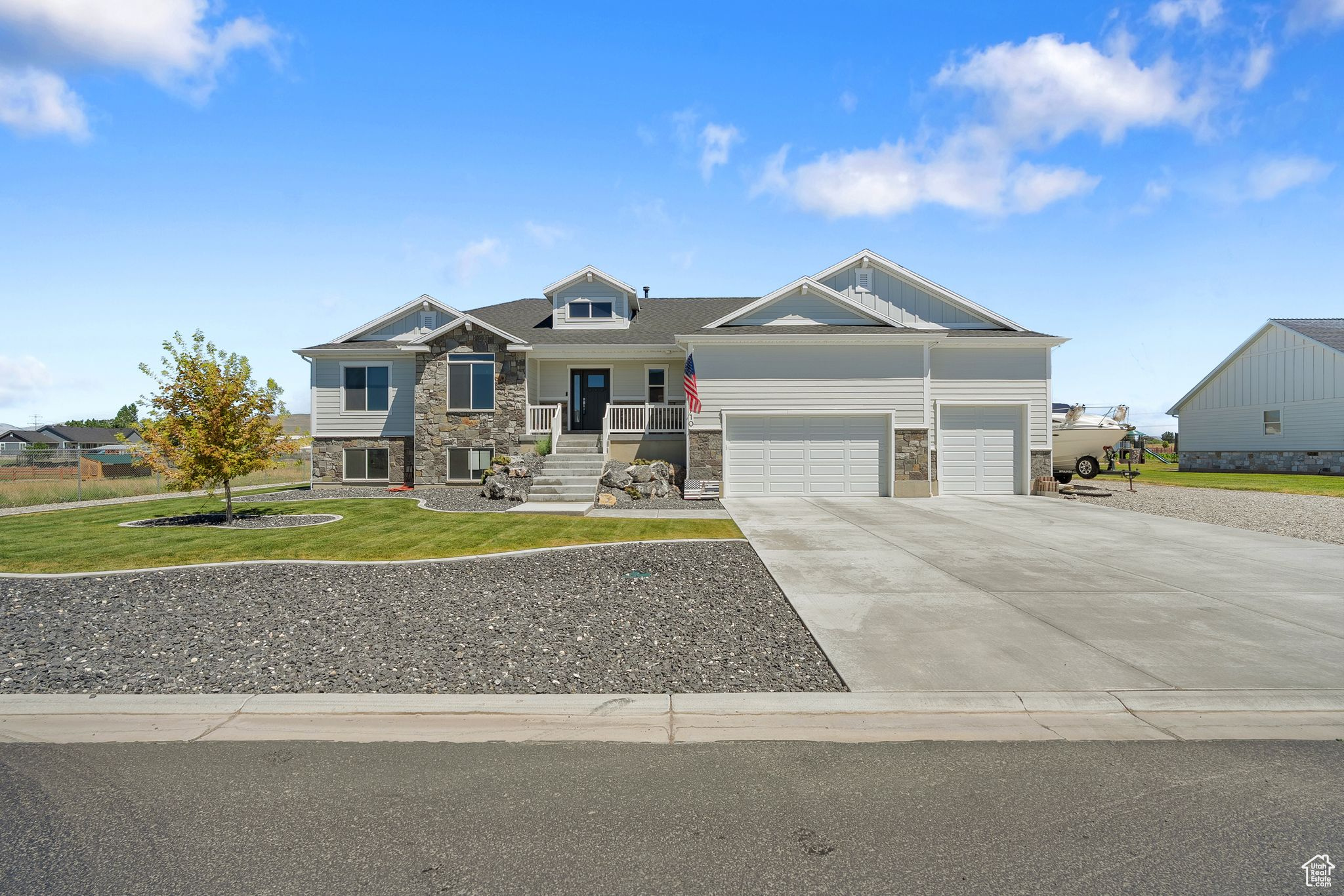 Escape the hustle of city life and embrace wide-open skies in this stunning home set on over one acreof land. With unobstructed mountain views, a valuable water share, and plenty of space to grow, this is the perfect blend of modern luxury and rural serenity. Step inside to find a thoughtfully designed 3-bedroom, 2-bath layout including a spacious primary bedroom with a walk-in closet and private ensuite. The kitchen is complete with double ovens, stainless steel appliances, and upgraded finishes throughout. The open-concept living area offers natural light and mountain views from every angle. Outside enjoy a professionally landscaped yard and various options for parking and storage with an RV pad and a 4-car garage.