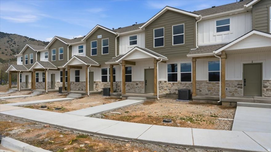 Beautiful new construction townhome in the heart of Morgan! This thoughtfully designed 3-bedroom, 2.5-bath home offers modern living with high-end finishes throughout. Enjoy an open and inviting main level featuring durable LVP flooring, quartz countertops, soft-close cabinetry, a pantry, and a full suite of LG stainless kitchen appliances-including refrigerator, gas range, microwave, and dishwasher. Upstairs, you'll find spacious bedrooms with walk-in closets, plush carpet, ceiling fans, and a convenient laundry room. Bathrooms and laundry areas feature stylish tile flooring, while recessed lighting enhances the bright, contemporary feel throughout the home. Built for comfort and efficiency with a Trane high-efficiency furnace and A/C, plus a 40-gallon water heater. The 2-car garage is prepped for a 50-amp EV charger, adding future-ready convenience. Exterior highlights include durable Hardie board and stone finishes, a covered front porch, and a covered rear entry. Enjoy low-maintenance living with fully landscaped yards and snow removal all handled by the HOA. High-speed fiber optic internet available. Includes builder warranty for added peace of mind. More units are available, contact agent for more information. Taxes are based off of lot only. Sq. footage per plans; Property facts are provided as a courtesy; Buyer to verify all information.