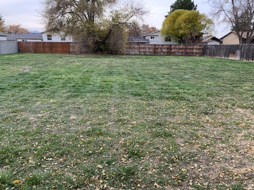 Vacant. Flat, flag lot on the back side of 8686 S. TEMPLE DR (1300 W). Could be purchased in conjunction with MLS# 2136967, which is the home on the front, toward 1300 west. If building a home on the lot, it is assumed that all utilities would come from 1300 West. Would be a great place to build, or store toys and work equipment.