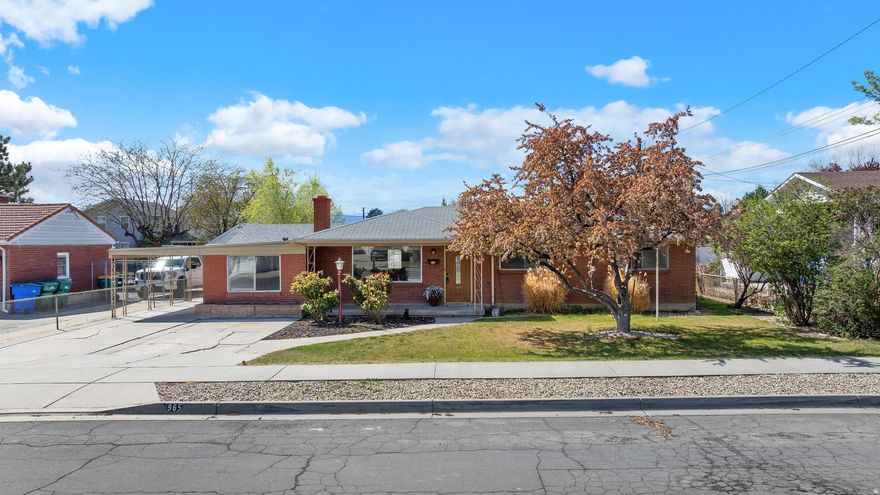 Classic rambler in the heart of Lehi. This 3 bed 2 bath home features two family rooms, large windows with tons of natural light, fresh paint, newer flooring, and is full of charm and character. Enjoy a large, fully fenced and landscaped yard with a covered patio and tons of storage space in the extra width garage and attached storage building. Park and store RV's, trailers, and toys through the additional backyard access or simply utilize the huge garden and lawn area.  Fantastic home, great neighbors, and quick access to I-15, schools, shopping, and dining. Schedule your private showing today. ***Square footage figures are provided as a courtesy estimate only and were obtained from county records. Buyer is advised to obtain an independent measurement.