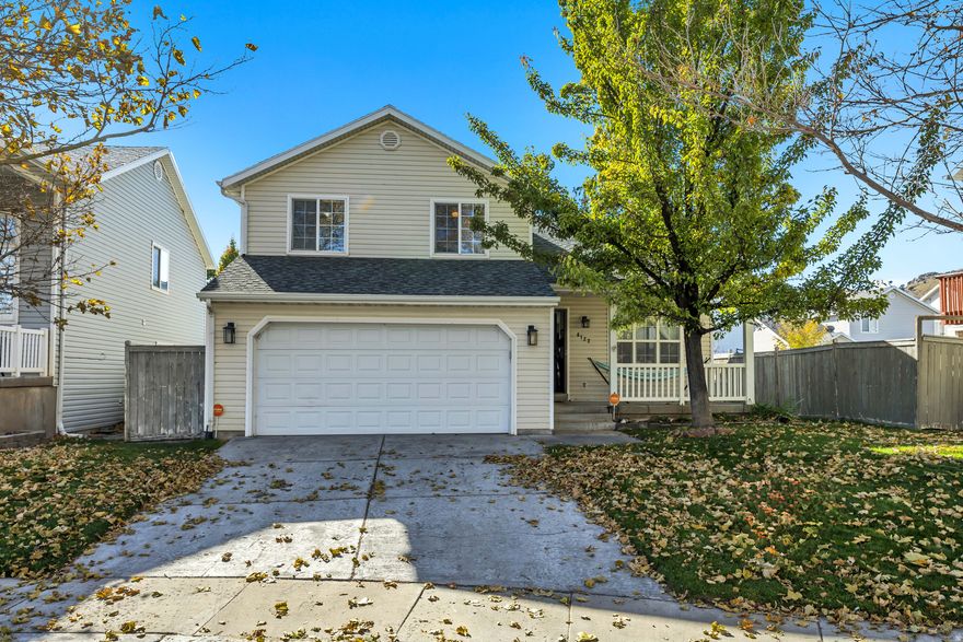 This inviting two-story home features a bright, open floor plan with vaulted ceilings and abundant natural light. The updated kitchen boasts solid surface countertops, a spacious breakfast bar, and ample cabinet space. Recent improvements include new carpet throughout, stylish new light fixtures, and a finished basement bedroom-ideal for guests, a home office, or additional living space. The basement also offers a large cold storage room with built-in shelving and a newer water softener. Outside, enjoy a fully fenced and landscaped yard with mature trees, two grow boxes, a garden area, and a convenient storage shed. Nestled in a quiet cul-de-sac just minutes from schools, parks, shopping, and paved walking trails. Square footage figures are provided as a courtesy estimate only; buyer to verify.
