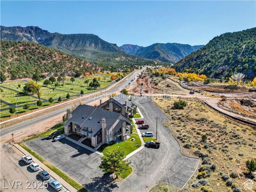 Charming 2-bedroom, 2-bath main level condo in the desirable Shingle Brook Condominiums of Parowan, UT. Located at the base of Parowan Canyon, just 13 miles from Brian Head, this inviting home offers an open-concept living room, dining area, and kitchen, perfect for relaxing or entertaining. Enjoy cozy evenings by the wood-burning fireplace after a day on the slopes or trails. Features include an outdoor gear locker for your skis, bikes, or hiking equipment. Explore Parowan's small-town charm with its community pool, parks, hiking trails, restaurants, shops & roadside attraction, the mysterious Parowan Gap Petroglyphs. Ideal as a year-round residence or seasonal getaway**no nightly rentals allowed**Offering comfort, convenience, and a true mountain-town lifestyle.