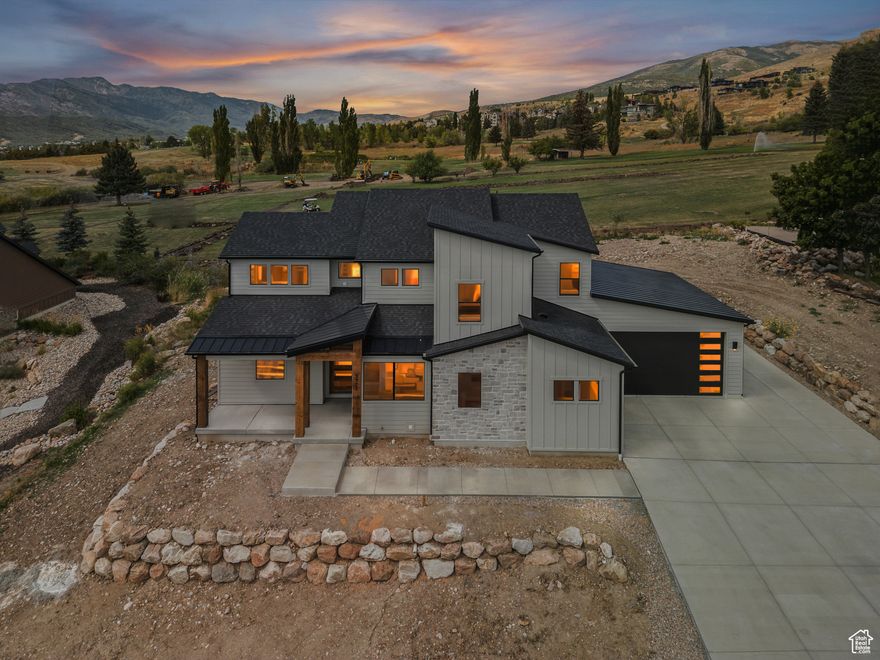 Luxury Golf Course Home in Eden! This stunning 6-bedroom, 4.5-bathroom home backs the Wolf Creek Golf Course. Unobstructed fairway & mountain views. Covered patio opens to the course. Gourmet Kitchen: Oversized fridge/freezer, gas range, double oven, large pantry, expansive island, & huge windows. Main-Level Primary Suite: Golf course views, tray ceilings, custom walk-in closet with wood shelving, double vanity, standalone tub, & dual-head shower. Flexible Layout: Main floor: Family room with fireplace, half bath, primary bedroom as the only bedroom. Second floor: Open to main level, bonus room (bedroom/den), Ensuite bedroom featuring private bath & walk-in closet, two additional bedrooms with large closets, double-vanity main bath, laundry with cabinets/countertop. Finished basement: Family room, second laundry, full bath with double vanity, & under-porch storage. Premium Finishes: Quartz countertops, tile/carpet flooring, wood pillars, & inviting front porch. Three laundry connections total, one on each floor. Additional Amenities: RV parking & electric dryer hookups on both levels. Lifestyle & Location: Minutes from three world-class ski resorts & Pineview/Causey Reservoirs for boating, fishing, & more. The finished basement suits entertainment or multi-generational living.