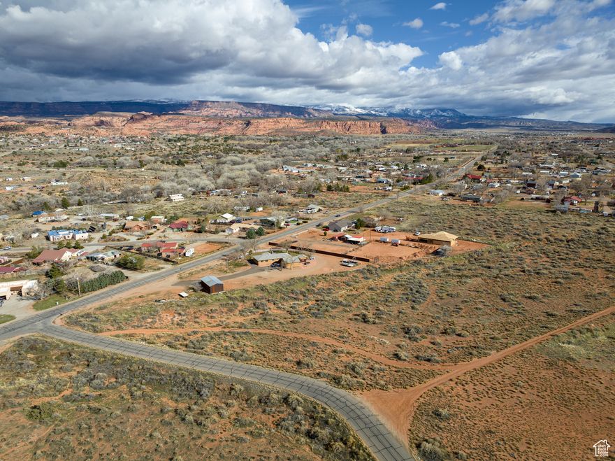 Premier Commercial Lot located in Moab's Strategic Growth Corridor. Secure your place in the McKnight Commercial Subdivision-perfectly located and just minutes from downtown Moab. Zoned General Business (GB), this subdivision offers unmatched versatility for commercial use, accommodating retail, office space, services, and more.  Prime Location: Positioned between HWY 191 and Spanish Valley Drive, only three miles south of downtown, providing exceptional accessibility and visibility.  Broad Use Zoning: General Business zoning supports diverse commercial opportunities, making these lots ideal for a variety of innovative business concepts.  Limited Availability: Only 9 lots remain out of the original 17.  Development-Ready: Road and critical utilities-water, sewer, power, telecom-are fully established, enabling immediate development.  Take advantage of this opportunity to be part of Moab's Limited Commercial Landscape.