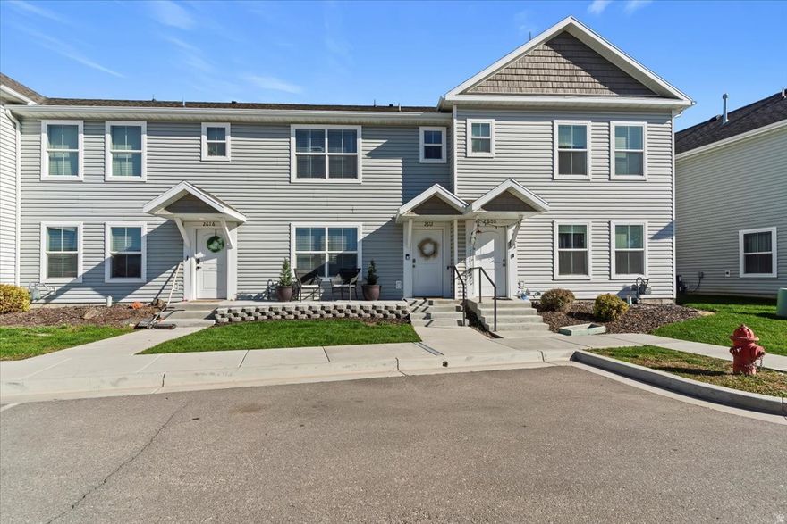 Welcome the new year in this move-in-ready townhome! Gated Sunset community near HAFB, parks & I-15. Fresh paint, feature walls, Alexa smart lighting, transferable security, new porch & parking. Appliances negotiable. Rental potential.