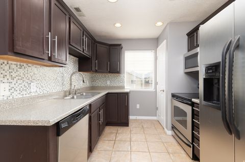 Tiny photo for 1511 W LEONARDO LN #A, West Valley City, UT 84119 (MLS # 2120586)