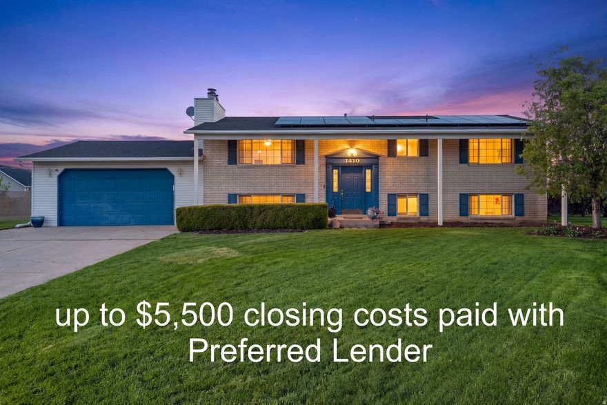 Finally!  A home that gives you space, flexibility, and long-term upside.  And it comes with a lender incentive up to $5,500 paid toward closing costs when using our preferred lender!  Tucked into a quiet cul-de-sac near the Syracuse border, this 6-bedroom home offers a layout that works for real life-whether you need room to grow, space for multi-generational living, or the opportunity to offset your mortgage with a separate basement setup.  The home has been thoughtfully updated with fresh paint and features a functional floor plan that gives you options most homes in this price range simply don't offer.  Step outside and you'll find a fully fenced .34-acre yard with mature trees and fruit trees, perfect for relaxing evenings, entertaining, or creating the outdoor space you've always wanted. The covered deck and patio extend your living space, and there's even a power hookup ready for a future hot tub.  Major systems have already been taken care of including newer HVAC, roof, and an upgraded electrical panel, giving you peace of mind from day one. Even better, the home comes equipped with paid-off solar panels, helping reduce monthly utility costs and adding long-term value.  Located in an established neighborhood with easy access to schools, parks, and commuter routes, this home blends comfort, flexibility, and smart financial potential.  If you've been looking for a home that gives you more than just a place to live-this is one you'll want to see in person.  Square footage figures are provided as a courtesy estimate only and were obtained from county records.  Buyer is advised to obtain an independent measurement.