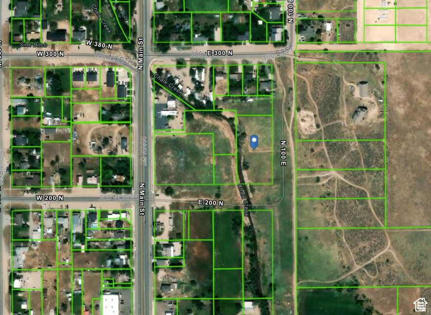 Discover 1.79 acres located just one block east of Main Street, in a versatile Office Residential zone. This zoning allows for a mixed-use of commercial, single-family, and multi-family homes, offering endless development possibilities. Conveniently located within city limits, the property has access to water, power, and sewer connections, which are available at the developer's expense. Please inquire with the city regarding additional building requirements. The land has been fully fenced, cross-fenced, and surveyed for your convenience. Recent city improvements have enhanced access to this property, making it even more appealing for your next project. Don't miss out on this prime development opportunity!