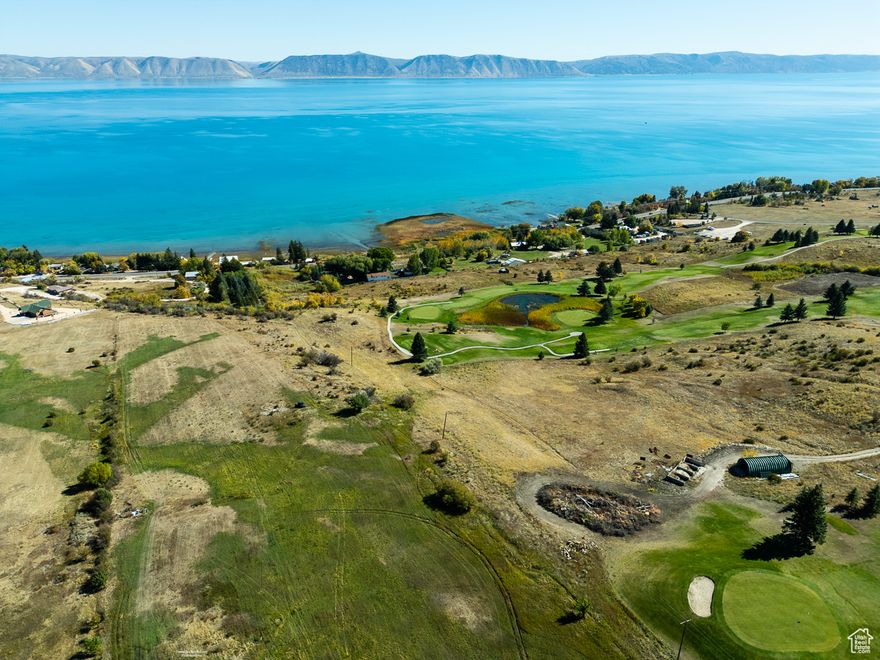 5 ACRES includes lake access just to the east of this property. Stunning views of Bear Lake! NO HOA. Perfect for those seeking privacy, space, and access to top-tier recreation, this property provides ample room to build your dream home, vacation retreat, or investment property. Enjoy panoramic views of Bear Lake's crystal-clear waters, along with the rolling greens of the golf course right next door. Located in a prime area for year-round outdoor adventure, you'll have easy access to boating, fishing, hiking, and winter sports. This rare 5-acre property offers the perfect setting to experience the best of Bear Lake living. Don't miss this unique opportunity to own a piece of paradise!