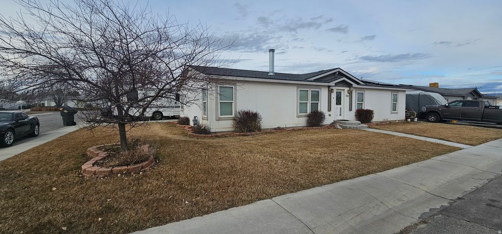 Photo of 755 E PINE ST S, Wellington, UT 84542 (MLS # 2136779)