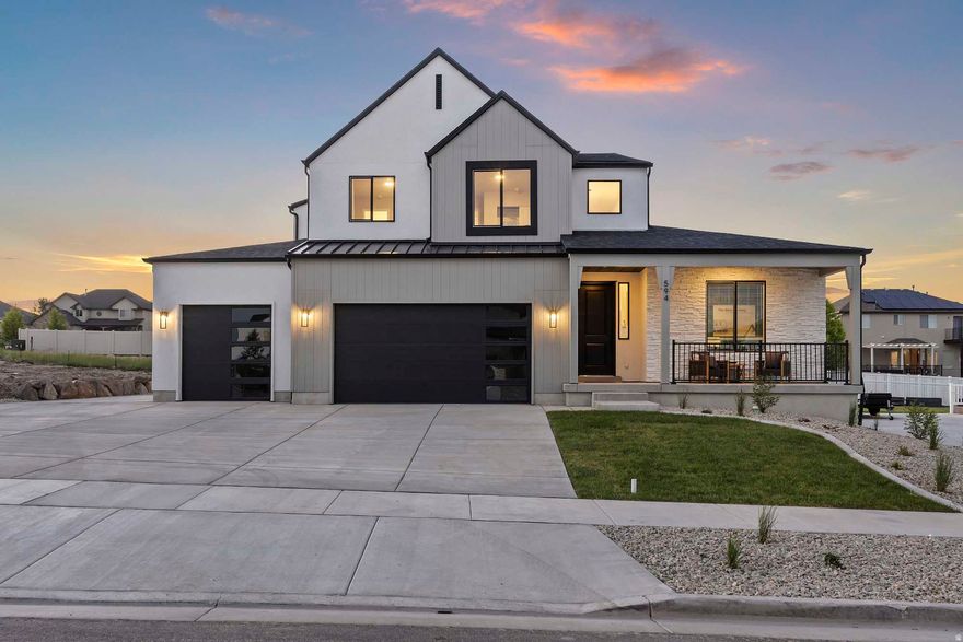 The Beautiful Dignity Subdivision Model Home in northern Saratoga Springs is now for sale. This cul-de-sac community has views of Utah Lake and gorgeous views of the mountains. This home is beautifully selected on a fully landscaped 1/4 acre south facing lot. With a fabulous incentive! $25,000 when using listed lender, or $23,000 when using outside lender, funds can be used towards closing costs and interest rate buy-downs. This lovely equipped Maple plan offers exceptional living space and modern design. The main floor features a spacious primary suite with a large, luxurious bathroom. The double-height great room, complete with a cozy fireplace, creates a stunning focal point for the home. The great room runs seamlessly into the kitchen and dining area. The basement, with its private entrance, 9' ceilings and plumbing for a future ADU is a future asset.  RV/Tenant parking area already installed. Contact me today for more details or to schedule a showing.