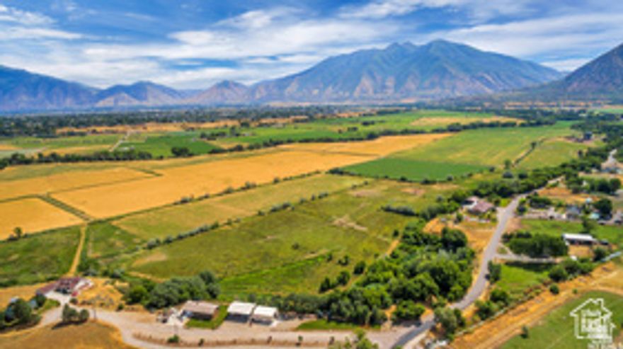 STUNNING 77+ acre family farm & 2 homes in Spanish Fork River Bottoms. There are multiple land parcels that make up the approx. 78 acres. Very seldom does a property of this size in this area come available! Sweeping views of the Wasatch Front Mountains. Green pastures and a serene atmosphere that is simply hard to come by. Centrally located and nestled in the heart of one of Utah County's fastest growing communities. Spanish Fork is where growth and all things are happening. Minutes to I-15, 15 minutes to Provo, 45 to SLC. Great future investment. Approximate address is 19 East South Field Road, between South SF Main Street and entering Salem. The listing includes the following parcels, 25:068: 0178, 27:045:0059, 27:044:0059, 27:045:0057, 27:045:0058, 25:068:0179, 27:045:002 19 South Field Road (1st home), 27:045:0022 12 South Field Road (2nd home). The acreage amount is an estimate as one parcel in question must be verified by a surveyor. Taxes are also an estimate, as the property has been in greenbelt. Listing Agent and listing brokerage accepts no responsibility or liability for the information contained in this listing. Any interest party buyer and or buyer broker should conduct an independent inspection and investigation to verify the information contained herein.