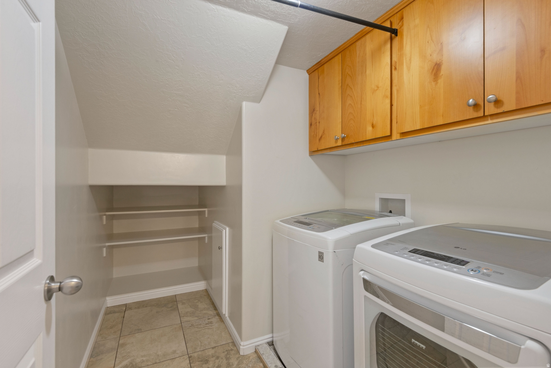 E TOWNHOMES AT CAMELOT VILLAGE - Residential