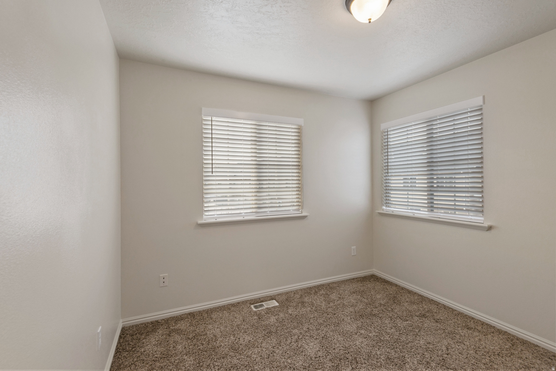 E TOWNHOMES AT CAMELOT VILLAGE - Residential