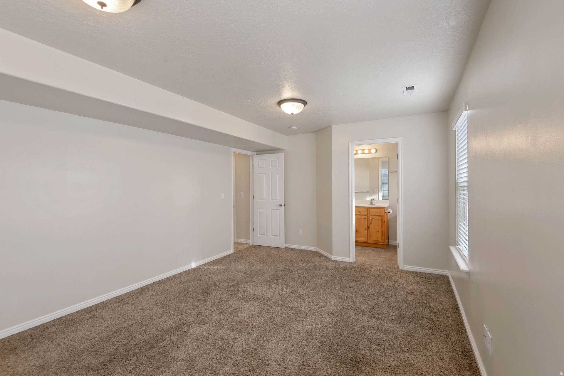 E TOWNHOMES AT CAMELOT VILLAGE - Residential