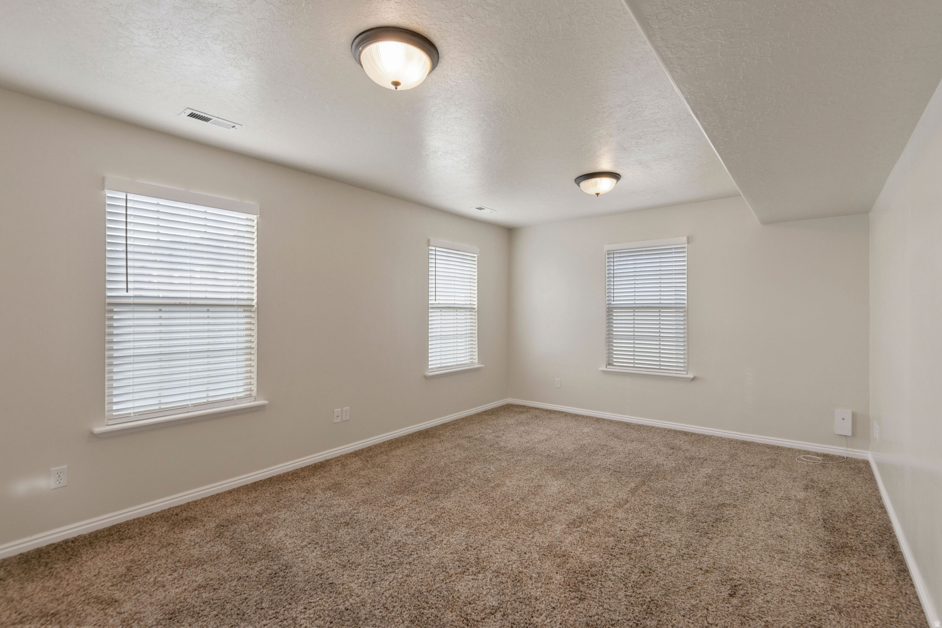 E TOWNHOMES AT CAMELOT VILLAGE - Residential