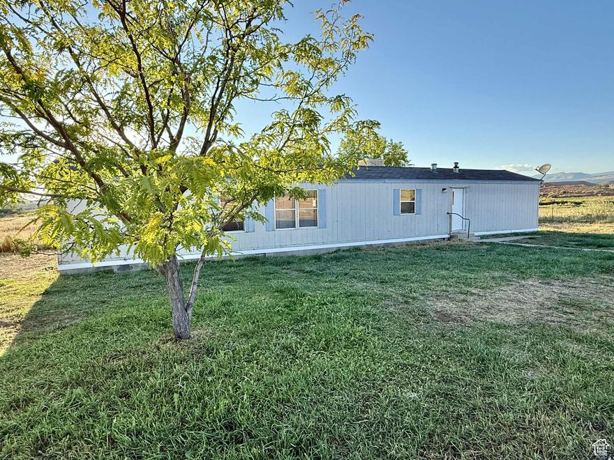 REDUCED! Tridell home is move-in ready, on .52  acre lot.  NEW Flooring & fresh paint!  Kitchen appliances included.  Primary suite has large, private bathroom and closets, laundry room comes complete with washer and dryer. Information and measurements are provided as a courtesy, buyer to verify all information.