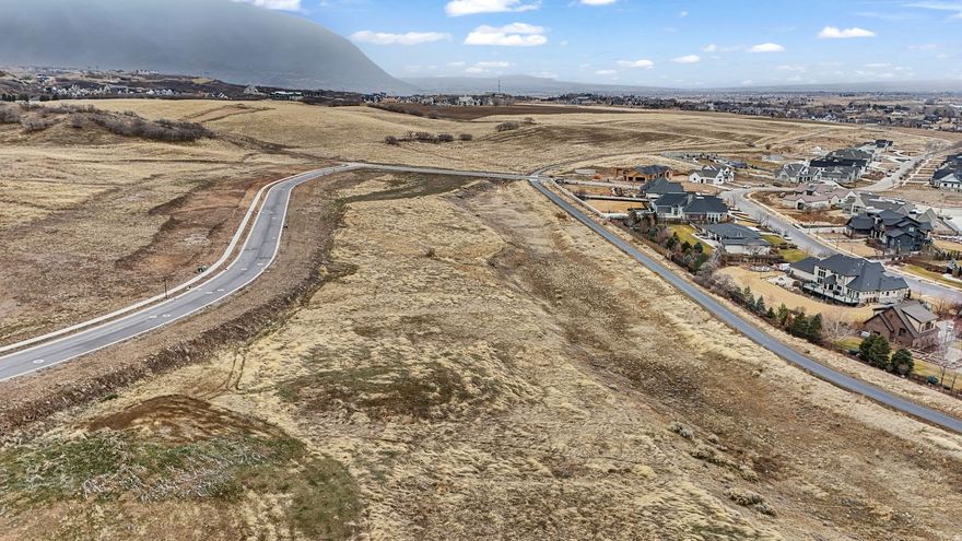 These beautiful 3.07 acres on Lot 58 are part of The Preserve at Mapleton community in Mapleton, Utah. Lot 58 sits along the foothills of Maple Mountain, with amazing sunsets, and open views of the Wasatch Range, Utah Lake, and the valley below. This lot is zoned for horses and has direct access to a future 2-3 acre community area with a stocked fishing pond, sandy beaches, walking trails, a pavilion and open space for recreation. With great schools and town just ten minutes away, you get privacy while still being connected. It's a solid opportunity to build in one of Utah County's most desirable communities.
