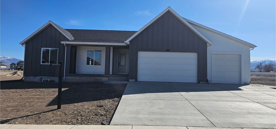 *UNDER CONSTRUCTION*  (Pictures updated 3-11-2026) Welcome to The Lexus at Cowboy Estates. **Seller is offering $24,000 incentive when using one of their preferred lenders. This beautiful home sits on .50 acre of land.  This home includes the following: Vaulted Ceilings in Primary bedroom and Living Room, LED Disc Lighting, Ceiling fan in Living room and Primary bedroom. Tall decorative baseboards. LVP flooring in all main areas including bathrooms. Quality carpet in bedrooms. A Beautiful gold chandelier hangs above the staircase. *Kitchen: Soft close Knotty Alder painted cabinets with gold hardware and granite counter tops with subway tile backsplash. Cabinets featuring end panels and crown moulding. Walk-in Pantry.  Stainless under mounted sink with disposal, walk-in pantry, stainless steel refrigerator, Induction stove top, oven, dishwasher and microwave that can be used as a convection oven.   *Bathrooms: Knotty Alder stained cabinets. Tile surrounds in tub and showers. European glass in Primary ensuite.  Adult height vanities. Taller, elongated toilets.  Central HVAC, Energy efficient furnace, Tankless Water Heater.  *Garage & Exterior Features: Third car bay, garage door openers, and 30 year architectural roof shingles.  -The pictures included are of the actual home in progress and a rendering of The Lexus.   Square footage figures are provided as a courtesy estimate only and were obtained from Builder Plans. Buyer is advised to obtain an independent measurement.