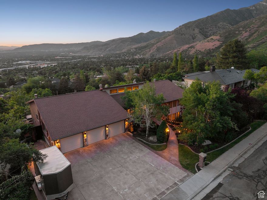***NEW PRICE $2,250,000! $250,000 BELOW APPRAISED VALUE*** Elevated Living in Olympus Cove  Discover breathtaking views and refined living at 4484 Parkview Drive, nestled in Salt Lake City's highly sought-after Olympus Cove neighborhood. This sprawling 9,000 sq ft residence on a .28-acre lot showcases panoramic views of the Great Salt Lake, State Capitol, University of Utah, and iconic Mount Olympus. With seven spacious bedrooms, six bathrooms, and a three-car garage, the home seamlessly blends elegance with everyday functionality. In 2025, the main level was completely reimagined to feature a designer kitchen with new cabinetry,  appliances, updated lighting, and expansive sightlines. The new open concept great room is ideal for entertaining and gathering. Enjoy brand-new flooring, fresh interior paint, modern light fixtures while overlooking a private, heated pool framed by mature landscaping and multiple outdoor living areas. A separate entrance leads to a versatile bonus room with a fireplace-perfect for an in-law suite, home office, nanny's quarters, or potential rental income. Recent upgrades (20242025) include recent repairs to main plumbing line and water line, updated gutters, an EV charging outlet, and a reimagined indoor pool room. The redesigned primary suite features a steam shower, while the new powder room, added mudroom, pantry, and expanded kids' playroom with a climbing wall provide thoughtful functionality. Tucked on a peaceful street with the sounds of owls and crickets at night, this home is just minutes from I-215/I-80 and surrounded by nature with direct access to Neff's Canyon and Bonneville Shoreline trails. Don't miss your chance to own one of Salt Lake City's most spectacular views!