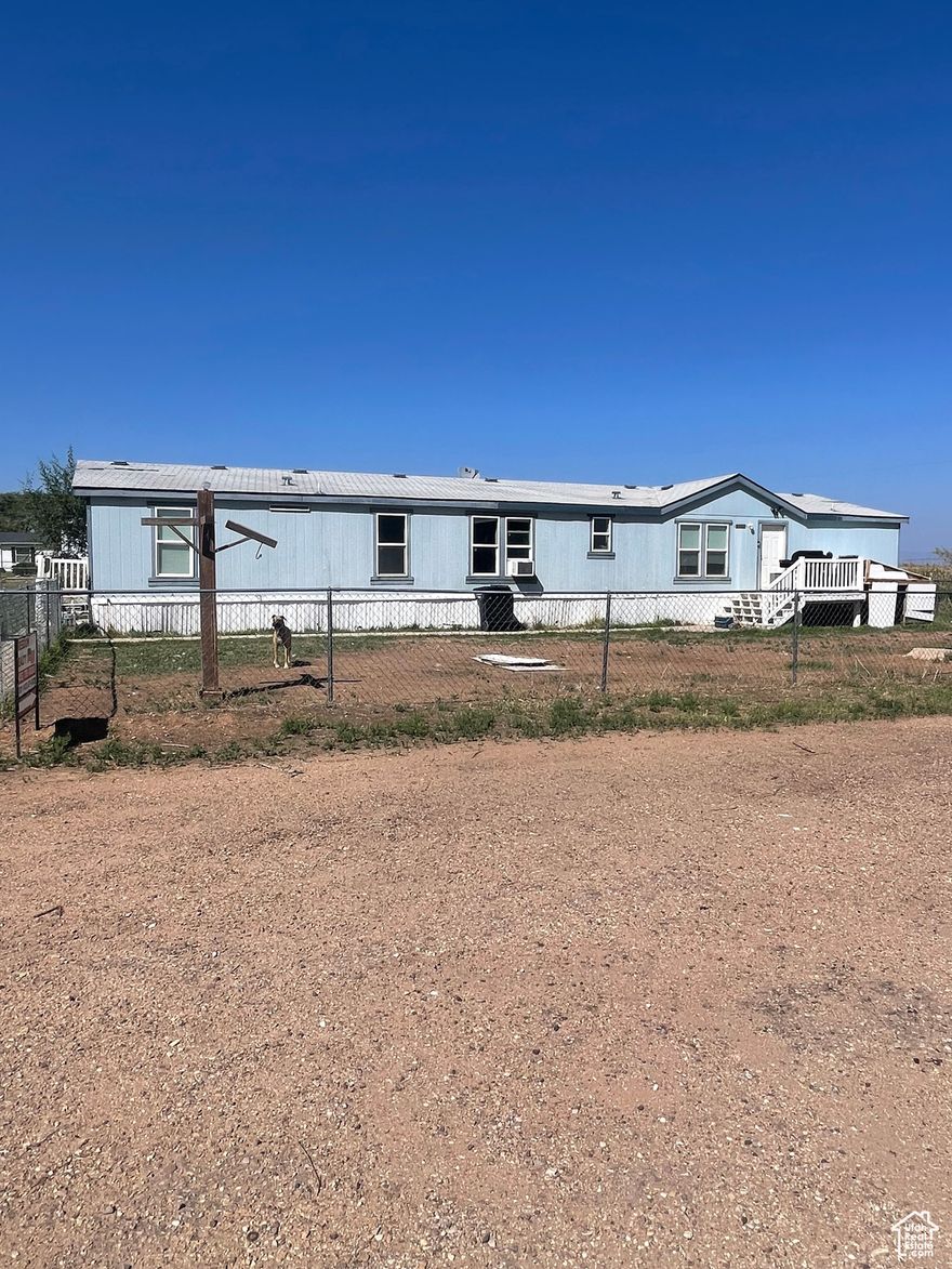 This five bedroom single-level home in Altamont is situated on 0.3 acres and located within walking distance to market, park, and schools. The large yard is fenced. This house is connected to city water and city sewer.  Square footage figures are provided as a courtesy estimate only and were obtained from county records.  Buyer is advised to obtain an independent measurement. All information is provided as a courtesy, buyer to verify.