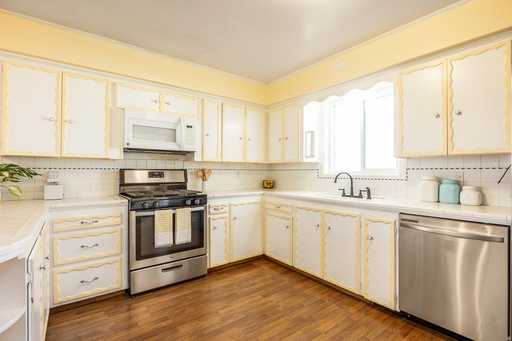 Photo of 6326 W 3500 S, West Valley City, UT 84128 (MLS # 2143667)
