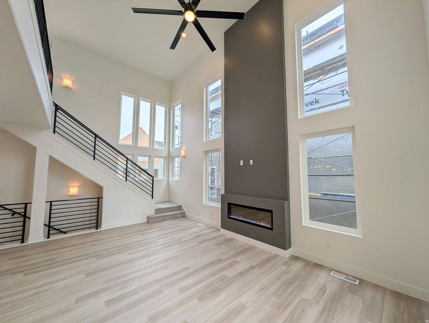 Beautiful brand-new, Move-in ready within 30 days! Priced with high-end, designer upgrades throughout. Featuring a gourmet kitchen with upgraded cabinets, sleek quartz countertops, and 9ft ceilings on all levels, this home is designed for both comfort and style. The open-concept layout boasts a spacious great room seamlessly connecting to the dining area and kitchen, perfect for entertaining. The main level also features a private office, a convenient butler's pantry, and easy access to the fenced backyard, ideal for outdoor gatherings. The expansive Primary bedroom has a generous walk-in closet and a spa-like en-suite bathroom, complete with a separate stand-alone tub and a sleek shower. With plenty of additional features, this home offers both comfort and style at every turn.