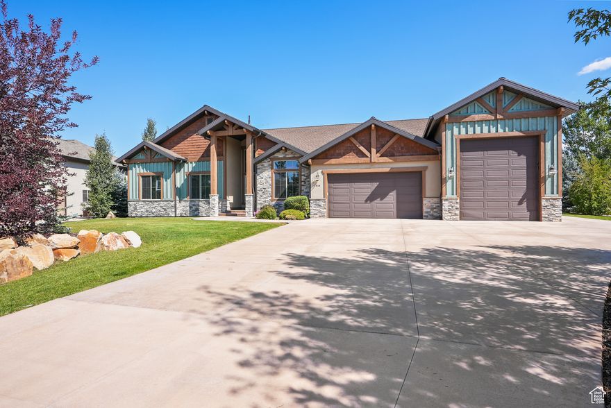 This AMAZING Contemporary Custom Mountain Home sits on a flat 3/4 acre located 20 minutes outside Park City and 10 minutes from Heber/Midway. The Home features vaulted ceilings, open living space with indoor/outdoor entertainment. Large primary suite with steam shower and jetted tub. Gourmet Kitchen features Thermadore appliances and oversized island. The large covered patio includes a hot tub with views of the Uinta Mountains and a stream that runs through the property. The daylight basement includes walkout entrance, 9ft ceilings and 3088 sq ft left open for customization. Newly installed 2 high capacity tankless hot water heaters, water softener and filtration systems. 5+ Car Garage features 1528 sq ft with 15 ft RV door (50' deep and 18' ceiling). Garage includes epoxy floors, custom cabinets, stainless steel fridge, freezer and large vault safe. RV Garage includes 220V power, hot/cold water and RV dump connections. With only 45 min from SLC airport and giving the relaxing setting makes this home A true MUST see!!