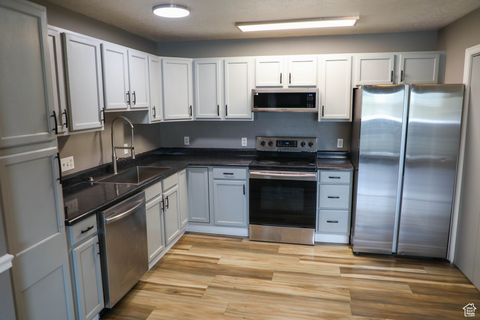 Photo of 8082 W COPPERFIELD PL #21, Magna, UT 84044 (MLS # 2117889)