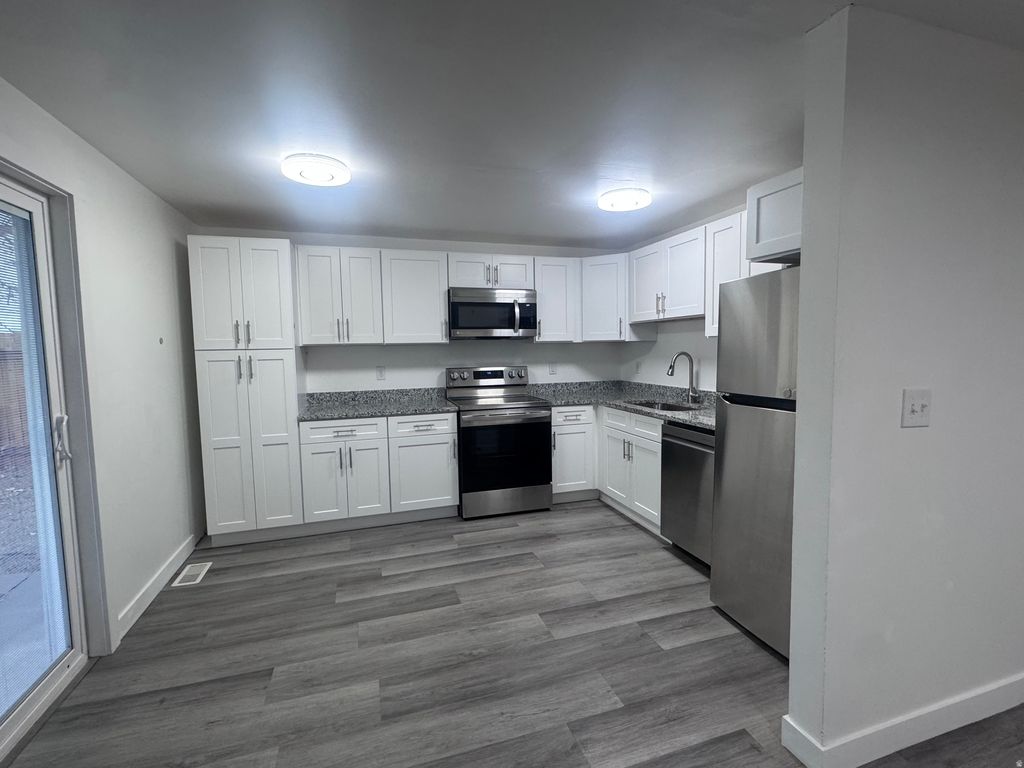 Photo of 6876 S 90 E, Midvale, UT 84047 (MLS # 2125033)