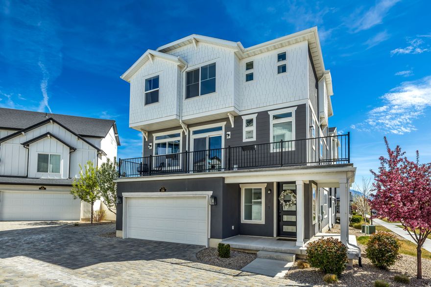 If you've been searching for a home that's easy to love, this is it. Welcome to a stunning residence where modern design meets low-maintenance living and exciting community amenities. With over 2,200 sq. ft., this home offers a bright, open layout and a spacious kitchen designed for both everyday living and effortless entertaining. Enjoy a massive island with a thick mitered edge, quartz countertops, a walk-in pantry, a stainless steel hood, an upgraded sink, and thoughtful touches like soft-close cabinets and a pull-out built-in garbage can cabinet. The home features durable LVP flooring, a beautiful statement fireplace, transom windows, and a generous living and dining space that flows out to the wraparound deck. Upstairs, the primary suite includes a walk-in closet, double sinks, dual shower heads, and a private water closet. Additional highlights include a dedicated office space ideal for remote work and a lower-level flex space that walks out to the covered patio and fully fenced yard with finished sod and beautiful mountain views. You'll feel the difference this home offers on every level. The home is close to neighborhood trails, parks, and the community pool. Located in the highly sought-after Wander community, the HOA covers driveway snow removal and community amenities, giving you more time to enjoy life and less time on maintenance. Conveniently close to shopping, dining, and commuter routes, this home delivers an ideal blend of comfort, convenience, and modern living. The owners invested over $54,000 in upgrades when they built in 2021-and it shows. Come see why this is the best home in the neighborhood.