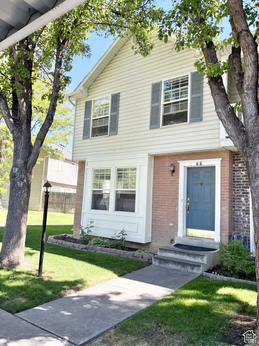 Adorable two-story end unit with a blend of privacy, convenience, and style in this beautiful townhome, just moments from top-rated schools, shopping, dining, grocery stores, and everyday essentials- new beautiful LVP flooring throughout the main level. Step outside to enjoy access to a spacious backyard. Residents also have access to a well-maintained playground and a charming community picnic area. With quick and easy access to I-15, this home makes commuting effortless.
