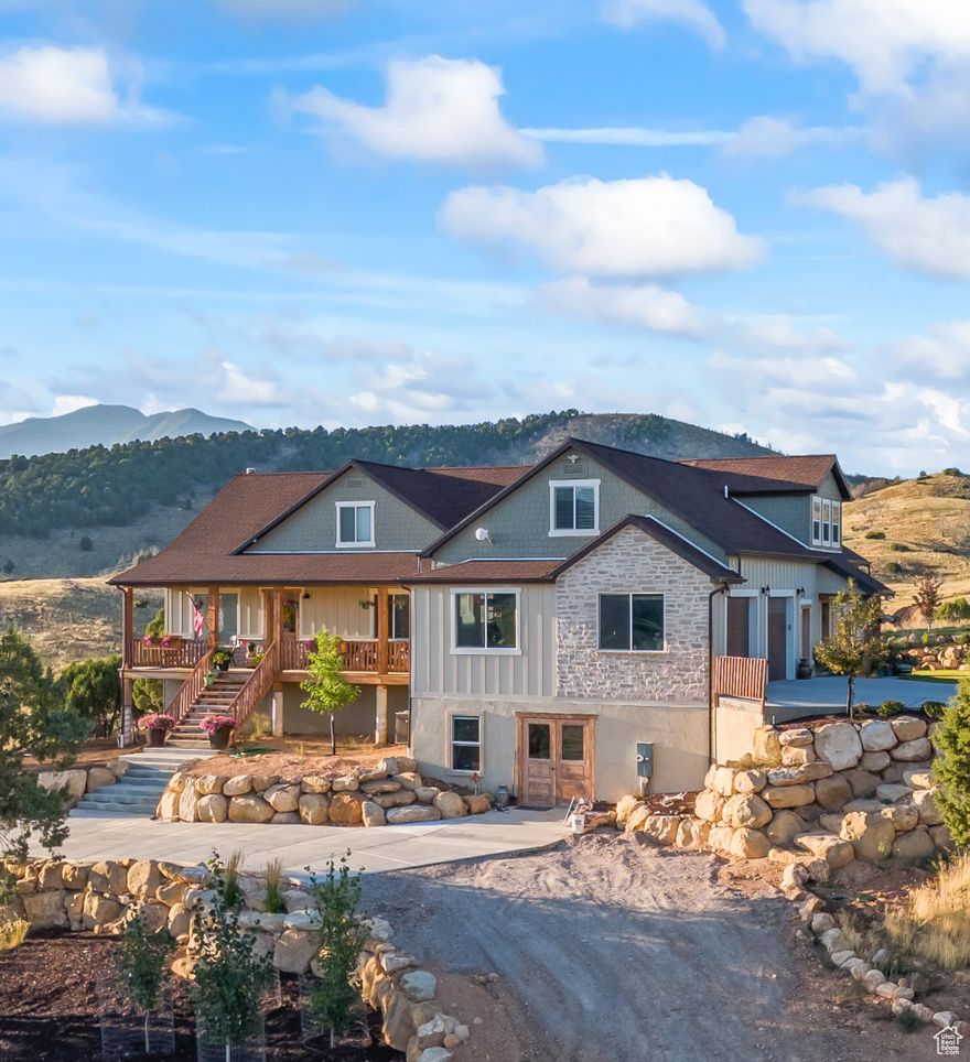 You will love this custom built home on 1 acre. Nestled up in the pines over looking the valley. This 6430 sqft, 6 bed, 5 bath home features a large entry with formal living. Large great room with wood burning fireplace. Beautiful custom kitchen with maple 'shrock' cabinets. Copper farm sink, Custom pull out drawers, quartz counters & maple wood block Island. Lrg Master suite with vaulted blue pine wood ceiling. Beautiful Master bath with large sep tub/shower, His & her sink counter area's. His & her walk in closets. Up stairs has a large sewing, craft area, workout room w/sauna and walk out deck. Basement is 98% finished needing only trim and a few finish's. Huge storage room, Full kitchen with room for a 2nd family room. Large room w/o a closet could be an office or another bedroom. 975 sqft workshop under the garage. Home has been built with ICF foam foundation, 2X8 thick exterior walls. HVAC system is zoned per level. Home is wired for a generator backup system. On the property is a Geo thermal 8ft deep 14X45 green house. You can grow a garden year round. Also a chicken coop with fencing. North side of property borders HOA common ground & BLM land. There is also an additional 1.00 acre lot to the south of the home for sale. Home shows beautifully clean & is well taken care of.