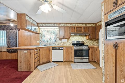 Tiny photo for 1773 W NORMAN Dr S, West Valley City, UT 84119 (MLS # 2126844)
