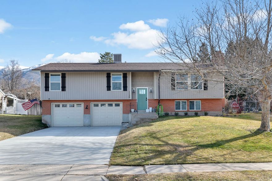 **OPEN HOUSE FEB 7TH, 11am-1pm.** Welcome to this updated split-entry home located in a highly desirable East Layton neighborhood. Offering approximately 1,981 square feet, 4 bedrooms, and 2 bathrooms, this home features a functional layout with multiple living spaces.  The main level offers an open floor plan and an updated kitchen with newer cabinetry, a large island, and quartz countertops. Improvements completed within recent years include updated flooring, paint, and a finished basement, providing additional living and entertaining space.  The lower level includes a spacious family room, bedroom, bathroom, and convenient storage. Additional features include a gas fireplace, central air, and an attached 2-car garage.  Outdoor living includes an oversized deck with mountain views and a fully fenced backyard with fruit trees, raised garden beds, and full landscaping. The property also features an auto-sprinkler system and basement entrance.  Conveniently located near Highway 89, shopping, dining, and schools.