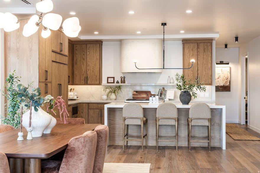 Welcome to Aprs, Cottonwood Heights' newest luxury boutique condo development located at the base of Big Cottonwood Canyon. These residences offer a true mountain lifestyle with a 12 minute drive to four world class ski resorts: Brighton, Solitude, Alta, and Snowbird. The property is also within walking distance to several popular dining options, including Porcupine Grill, and is only two minutes from I-215 for quick access to downtown Salt Lake City and the airport. Each residence features 10 foot ceilings, oversized windows, and professionally designed interiors by Alder and Tweed. Kitchens include Sub-Zero and Wolf appliances, a 42 inch custom limewashed vented hood, quartz countertops with full height backsplash, and engineered hardwood flooring throughout the main living areas. Floor plans include both two bedroom and three bedroom options, each are designed to capture mountain or valley views. The building is constructed with concrete assembly between each floor to provide exceptional soundproofing and privacy. The property also features secured building access along with temperature-controlled underground parking for added comfort and peace of mind. Aprs offers a full suite of luxury amenities. The recovery spa includes saunas, a steam room, cold plunges, and a relaxation lounge. There is also a fitness center with free weights and machines, along with a separate yoga and meditation studio. The rooftop deck features panoramic views while enjoying the hot tub, firepit, BBQ, pergola, outdoor TV, and multiple seating and dining areas. A grand lobby with a large fireplace and several seating areas welcomes owners and guests. Experience a refined lock-and-leave lifestyle in one of the most desirable locations along the Wasatch Front. Living at Aprs is designed to be just as memorable as a day on the mountain. Sales Gallery is at 7333 Canyon Resort Drive and is open Mon - Fri from 12-5pm; Sat from 11-4pm; and Sunday by appointment.