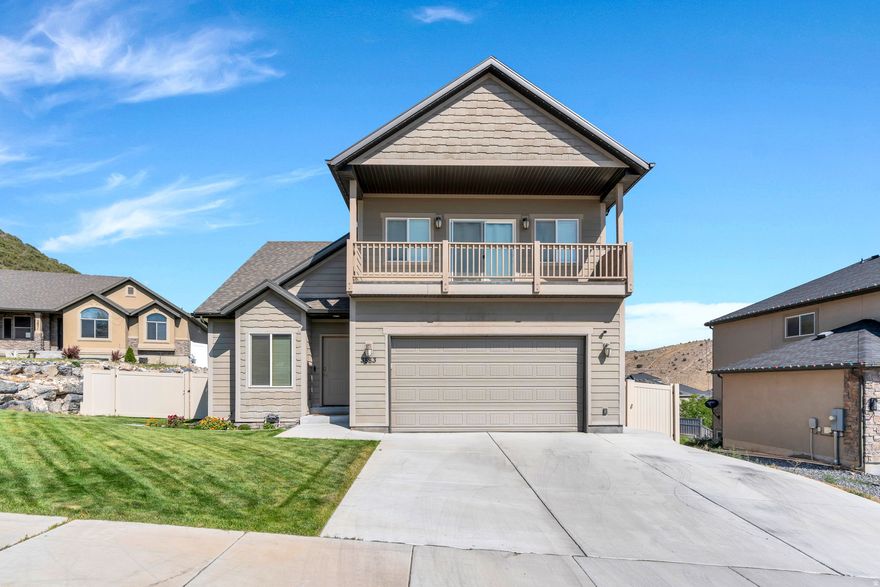 BEAUTIFUL, MOVE-IN READY, FRESHLY painted, FULLY FINISHED home with VIEWS of the valley, mountains and lake that can be seen from the OVERSIZED deck with Trex from the LARGE LOT. Enjoy your own personal OASIS with a fully landscaped yard including a MULTISPORTS court (pickleball, basketball, etc), shed (with workshop and power), gardens, dog run and firepit! UPGRADED kitchen with oversized cabinets and gas stove. The entire home is adorned with CROWN MOLDING around the doors, windows and VAULTED ceilings. NEWLY painted balcony attached to master bedroom provides for VIEWS from the front of the home as well. Storage GALORE in the garage, shed and basement! WALKOUT basement with surround sound. Square footage figures are provided as a courtesy estimate only and were obtained from county records. Buyer is advised to obtain an independent measurement.