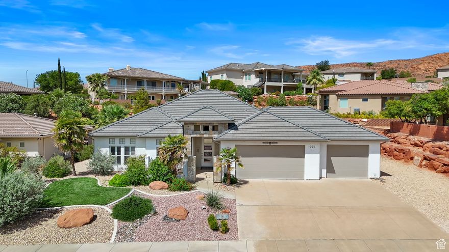 Welcome to your dream home-perfectly nestled on a spacious 1/3-acre lot in a peaceful, sought-after Green Springs neighborhood. Just a half block from the Green Springs Golf Course, you can cruise over in your own golf cart and enjoy the lifestyle you've been dreaming of. This beautifully maintained home boasts an open-concept floor plan with stunning views of the Red Mountains and Pine Valley Mountain Range right from your front patio. Enjoy soaring ceilings, a cozy gas fireplace, and a layout designed for both everyday living and easy entertaining. You'll love the oversized 3-car garage-perfect for storage, hobbies, or a full size truck-plus dedicated RV parking for all your adventure toys. The low-maintenance desert landscaping makes upkeep a breeze, giving you more time to  relax and take in the views.  Additional highlights include granite countertops, a large master suite with a soaking tub, a dedicated office or den with a private entrance, and a covered back patio ideal for enjoying Southern Utah's sunsets.  Located just minutes from I-15, restaurants, shopping, and trails, plus access to top-tier community amenities like a clubhouse, pools, spa, and pickleball courts.  This is more than a homeit's a lifestyle. Don't miss your chance to live in one of Washington's most desirable golf communities.  Buyer to verify all information