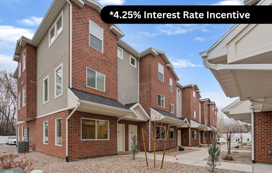 Building equity in your brand-new home is more achievable than you think. Lock in an interest rate AS LOW AS 4.25% when you work with our prefered lender making homeownership even more affordable. This stylish end-unit townhome is designed with light-filled living spaces and a layout that feels open and comfortable. It offers three spacious bedrooms, two and a half baths, and thoughtful finishes like granite countertops, stainless steel appliances, luxury vinyl plank flooring, and integrated smart home features including programmable thermostats, door locks, and lighting. The attached garage adds both convenience and storage. Situated in The Villas at the Point on 12th Street, you're just minutes from I-15, shopping, dining, and everyday essentials. The swimming pool, clubhouse, and playground are scheduled for completion in 2026, adding long-term value to your investment. The HOA covers high-speed internet, sewer, garbage, insurance, and smart home services. Perfect for first-time buyers or renters ready to make the leap into ownership. Buyer to verify all listing information.