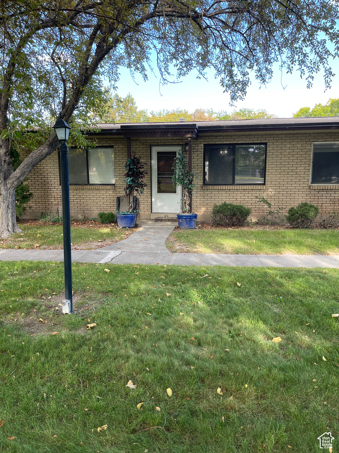 Rare opportunity in Ridgeland Downs, West Valley! Main-level all-brick rambler with central air in a quiet, well-kept community. Enjoy shade trees, landscaped grounds, basketball court, playground & private gated patio. Includes 2 parking stalls (1 covered) + oversized storage. Minutes to Valley Fair Mall, schools, parks, freeway, Bangerter Hwy & only 10 min to downtown SLC! Second refrigerator in carport storage included in the sale. **Property may qualify for Single-Unit (Spot) FHA Approval even though the complex is not approved as a whole.**