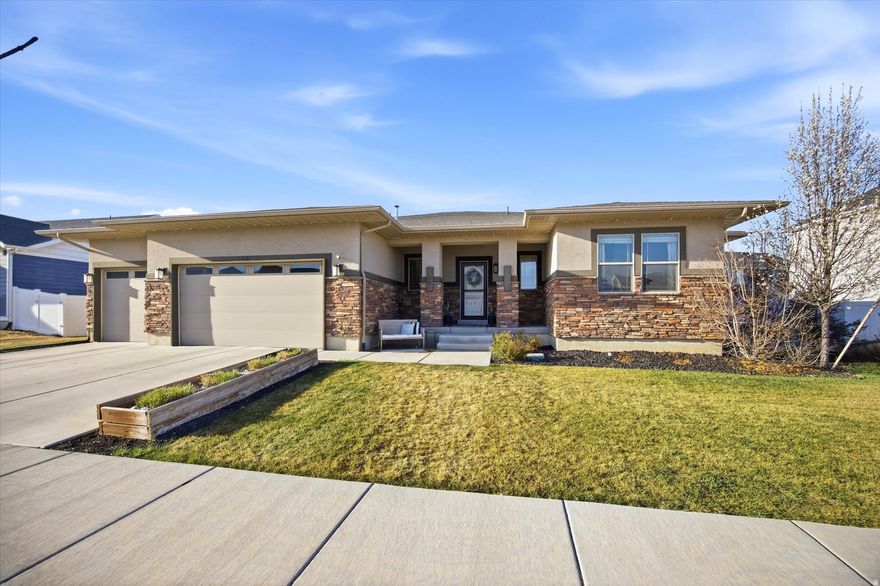 Designer curated home with all the upgrades located in one of Saratoga Springs' most sought after neighborhoods. This beautiful home features an open floorplan with the large kitchen serving as the hub. Oak cabinetry, Gas cooktop with double wall ovens, dedicated charging drawer, and a full slab island ready for baking and entertaining. The main level features a spacious primary suite with walk-in closet soaking tub and separate shower. Two more bedrooms on the main level share a hall bathroom. The fully finished basement features two gas fireplaces, game room, media center and is stubbed for a future kitchen or entertainers bar area. Three more bedrooms and a full bathroom provide plenty of space for all! Don't miss this opportunity to own one of the most upgraded homes in the community!