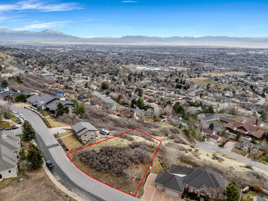 Rare opportunity to own a premium 0.61-acre lot with breathtaking mountain and valley views in the highly sought-after Sherwood Hills neighborhood of East Provo. This expansive property offers the ideal setting to build a custom home surrounded by natural beauty, mature landscapes, and established luxury residences. Enjoy stunning views of Rock Canyon and the Wasatch Front, with easy access to outdoor recreation including hiking and biking trails just minutes away. Conveniently located near Brigham Young University, The Shops at Riverwoods, Rock Canyon Park, and major commuter routes, offering both privacy and accessibility. One of the few remaining lots in this desirable East Provo community. Measurements provided as a courtesy only, buyer to verify all info.
