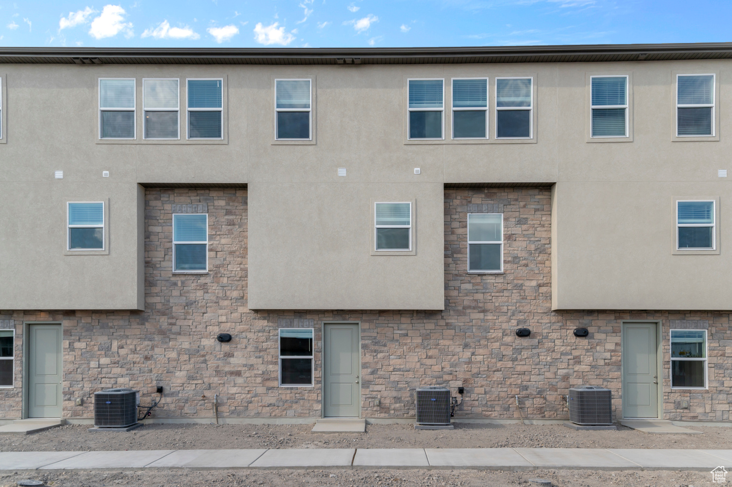 Come see this beautiful brand new Aspen townhome that offers a welcoming design with thoughtful finishes and modern conveniences throughout. This home features a kitchen that is beautifully appointed with white laminate cabinets, sleek quartz countertops, and stainless steel gas appliances, creating the perfect balance of style and function for everyday cooking and entertaining. The interior features a combination of laminate hardwood, vinyl tile, and soft carpet flooring, adding both durability and comfort to each living space. Craftsman-style base and casing enhance the home's clean lines and timeless appeal. The owner's bathroom provides a spa-like retreat, complete with cultured marble shower surrounds and elegant satin and brushed nickel hardware. Energy-conscious buyers will appreciate the tankless water heater and energy-efficient options, designed to provide modern comfort while reducing utility costs. With its bright finishes, functional layout, this home is the perfect blend of style, comfort, and efficiency.