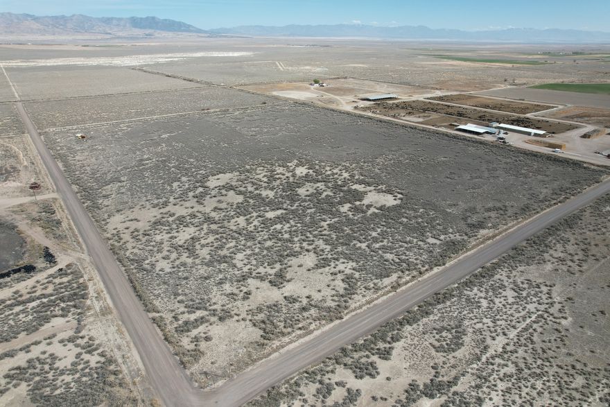 80 acres of vacant land located just outside the Delta city limits with AG-1 zoning, offering excellent potential for residential, recreational, or future investment use. This property provides wide-open space and convenient access while still being close to town amenities. The Delta area is seeing significant industrial growth, including new data center developments planned near Delta. Seller has more land available. Address is approximate. Buyer to verify all information.